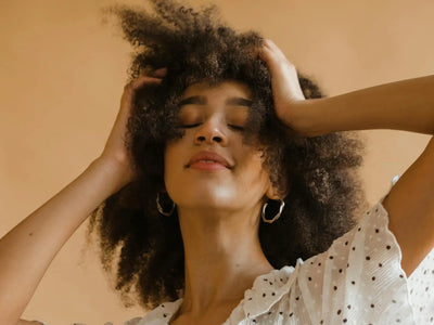 Before and after charlie's hair and beauty - portrait of a confident woman with natural curly hair, exuding empowerment an...