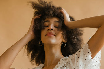 Before and after charlie's hair and beauty - portrait of a confident woman with natural curly hair, exuding empowerment an...