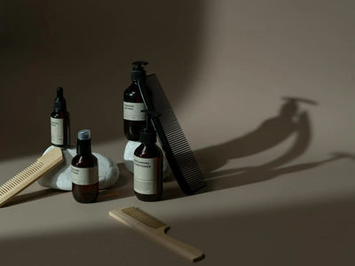 Displaying moisture - minimalist display of beauty products, combs, and natural elements on a neutral background. for mois...