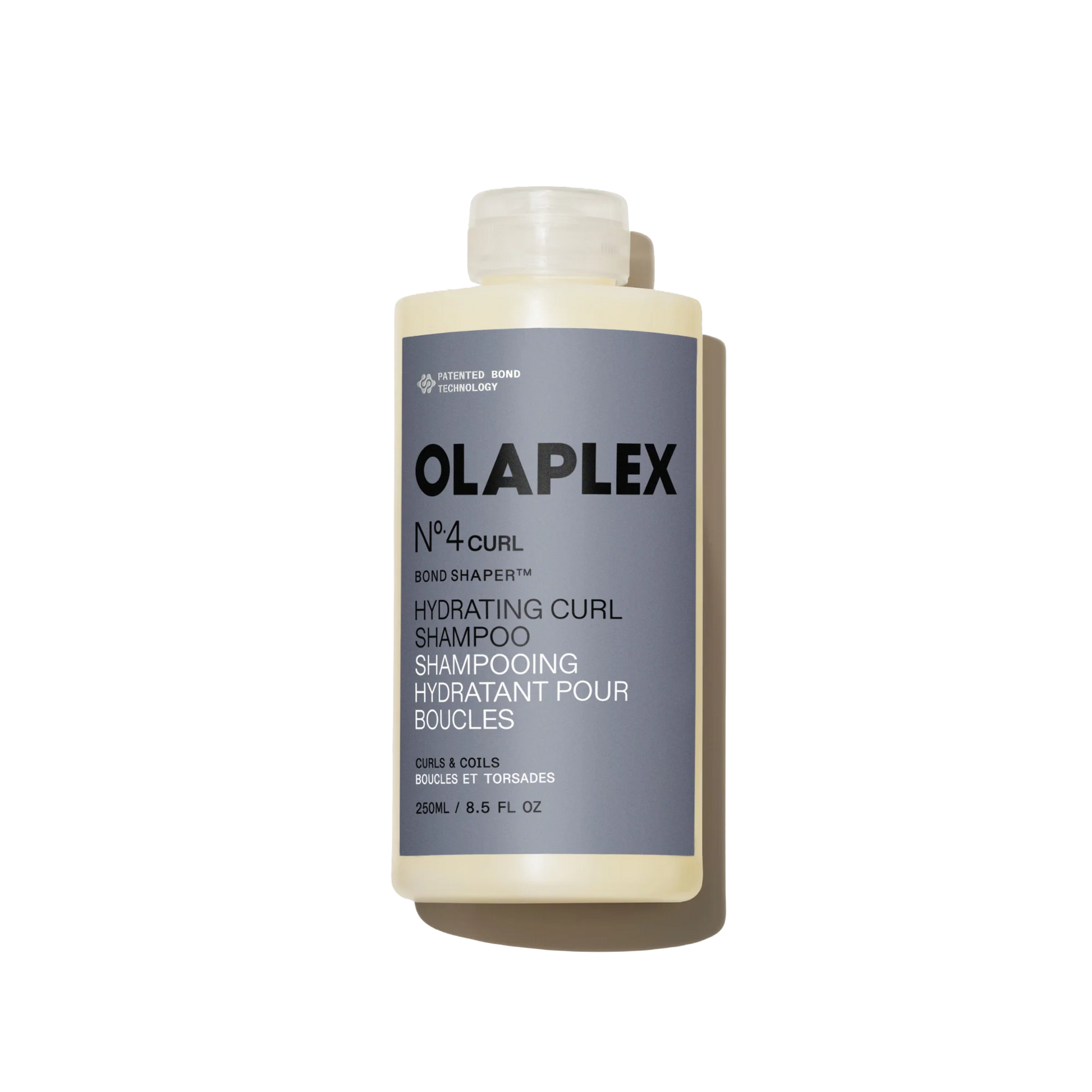 Olaplex No.4 Curl Shampoo bottle on a white background