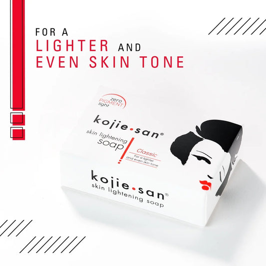 Kojie San skin lightening soap packaging on a white background with promotional text.