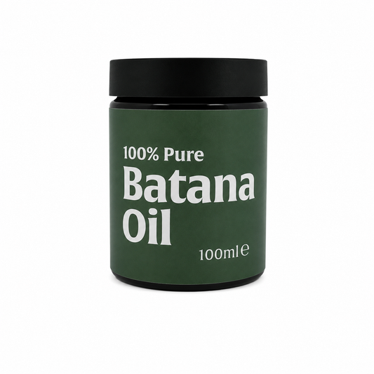 A 100ml jar of 100% Pure Batana Oil with a dark green label and a black lid, shown on a plain white background.