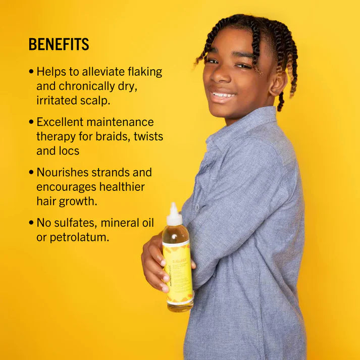 Person holding a bottle of hair care product with benefits listed on a yellow background