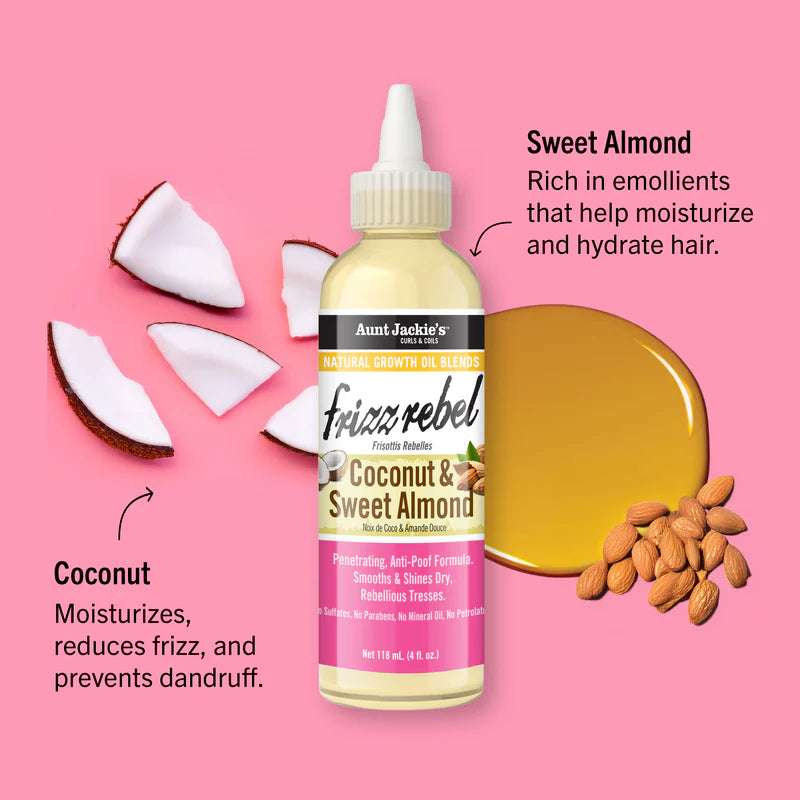 Aunt Jackie's Fizzz Rebel Coconut & Sweet Almond hair oil bottle with coconut pieces and almonds on a pink background.