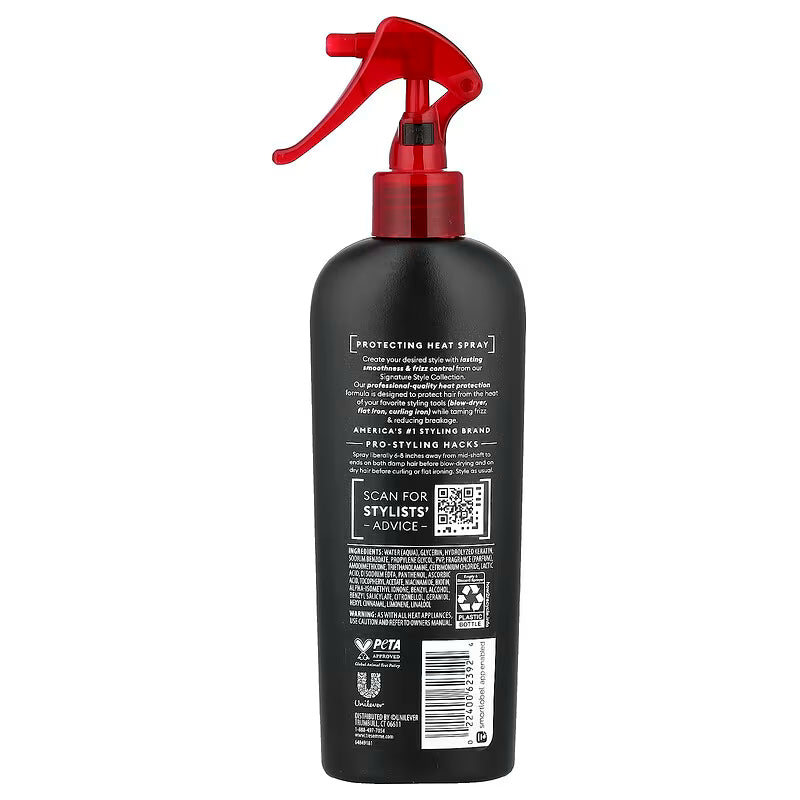 Black spray bottle with red nozzle on a white background