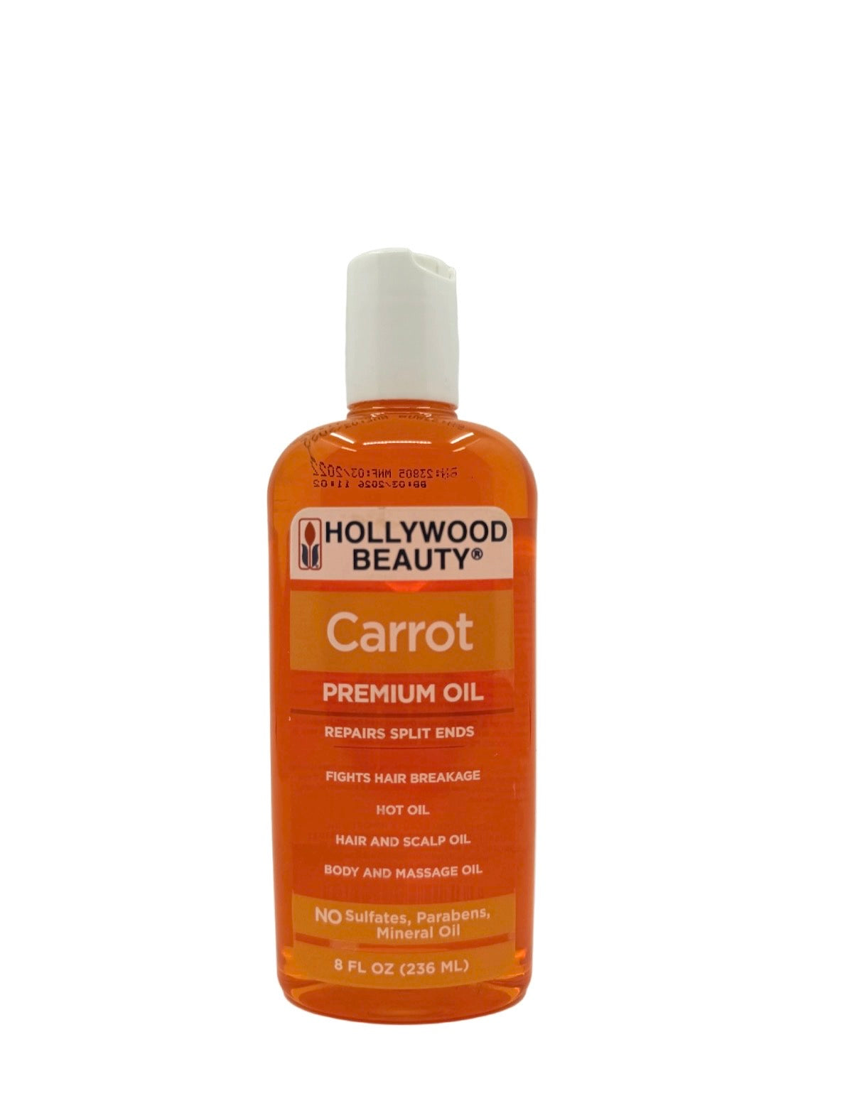 A bottle of Hollywood Beauty Carrot Premium Oil on a plain white background. The bottle is made of translucent orange plastic with a white cap, and the label clearly displays the brand and product name.