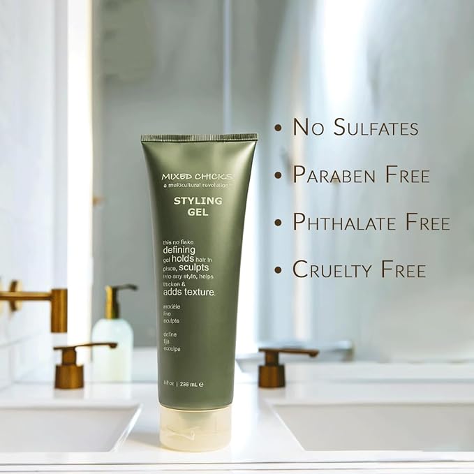 Green bottle of styling gel on a bathroom counter with product features listed.