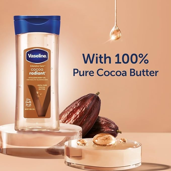 Vaseline Cocoa Radiant body oil bottle with cocoa butter fruits on a beige background