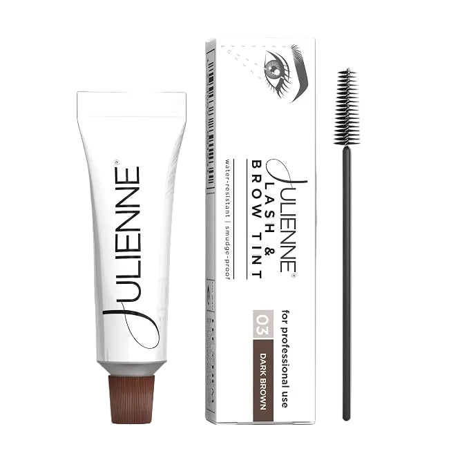 Julienne Lash & Brow Tint with packaging on a gray background
