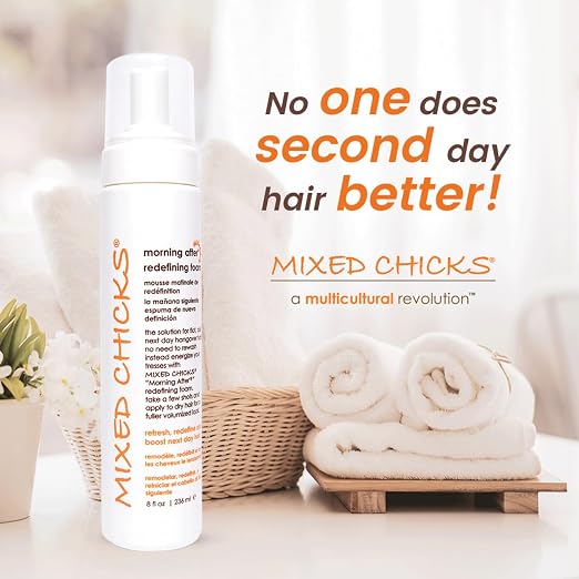 Product bottle with text 'No one does second day hair better!' by Mixed Chicks on a neutral background.