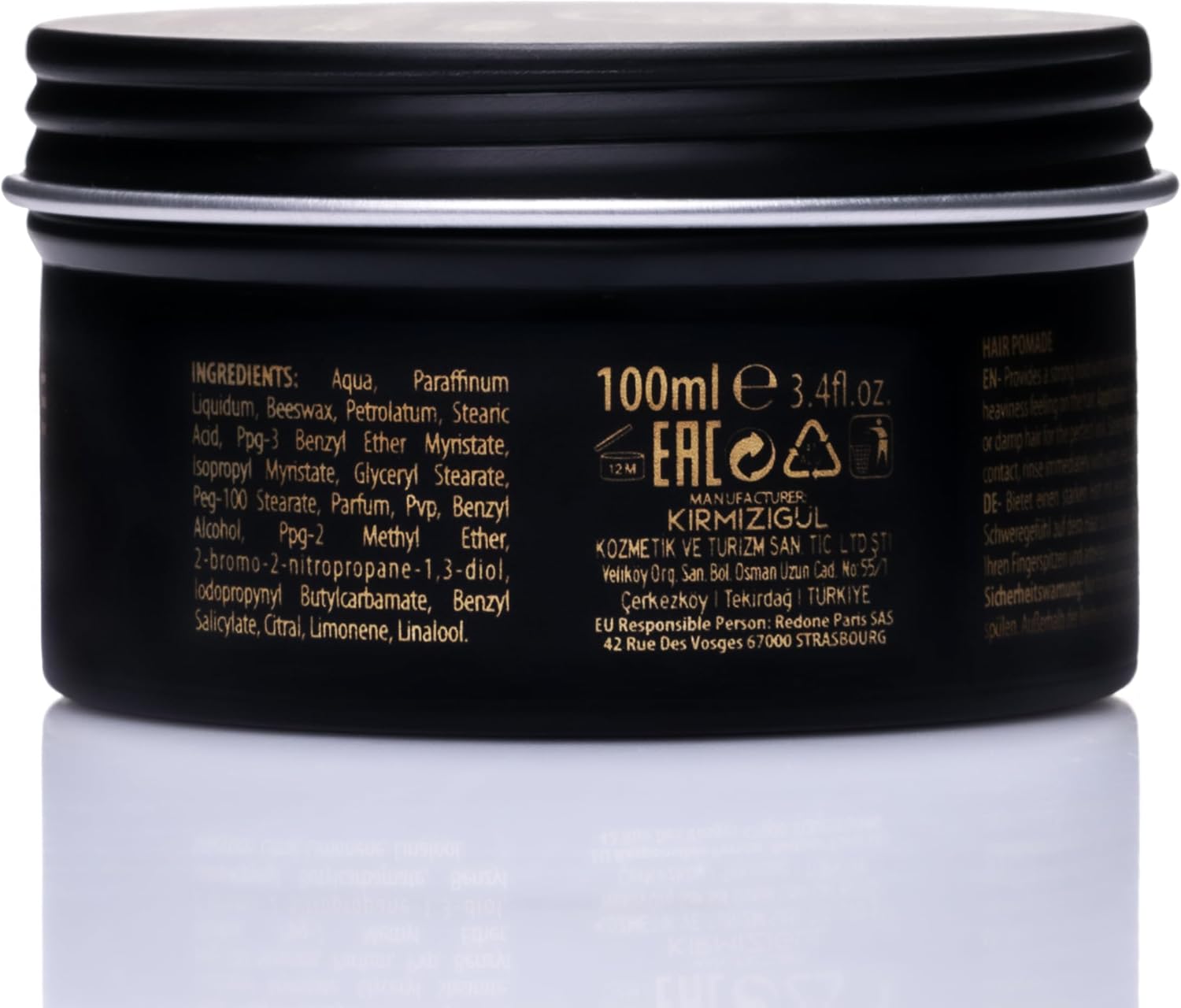 Black container with gold text on a white background