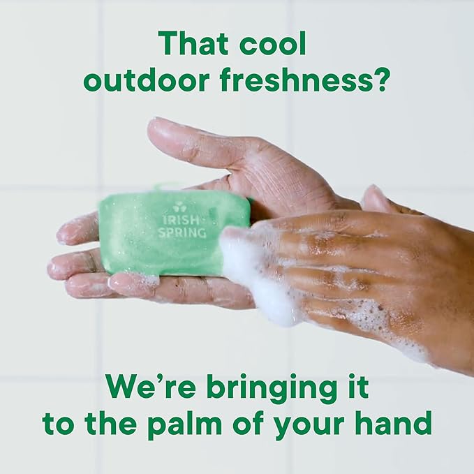Irish Spring soap bar with hands holding it and soap suds, text about outdoor freshness.