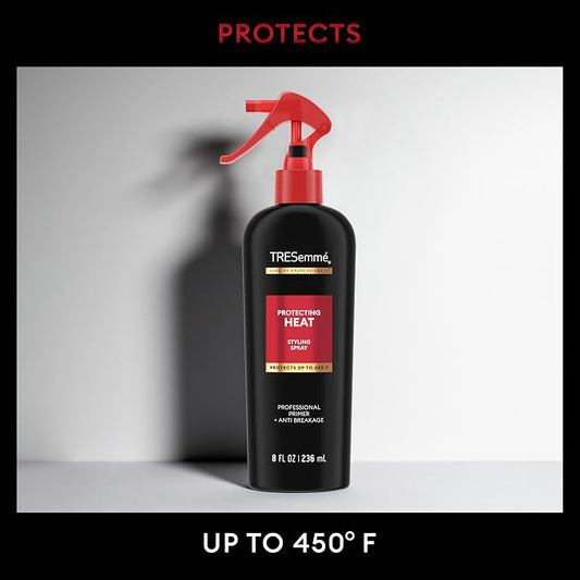 TRESemmé heat protectant spray bottle with red nozzle on a white background