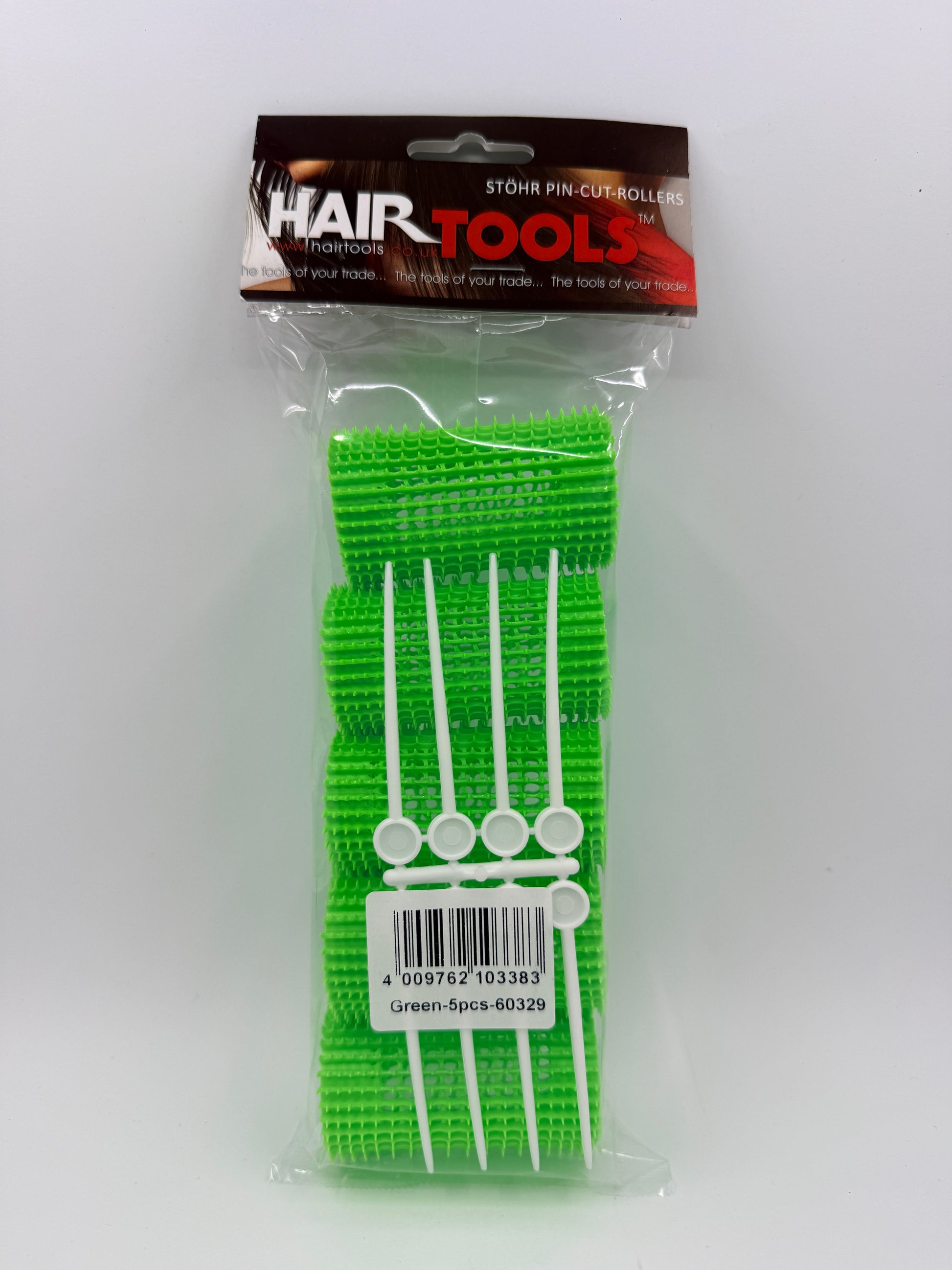 Green hair ties in packaging with 'Hair Tools' branding on a white background