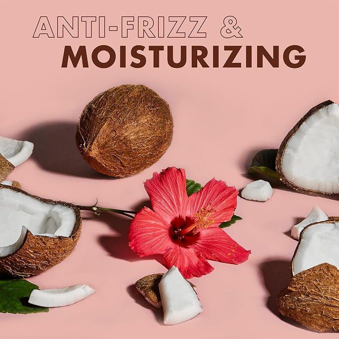 Coconuts and a pink flower on a pink background with 'Anti-Frizz & Moisturizing' text.
