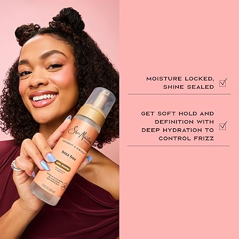 Woman holding a hair product with text about hair care on a pink background