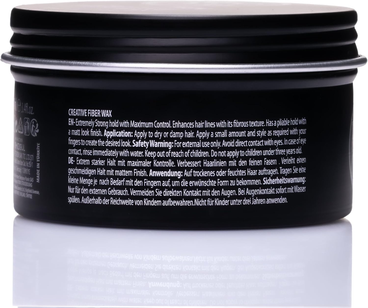 Black hair product container with text on a white background