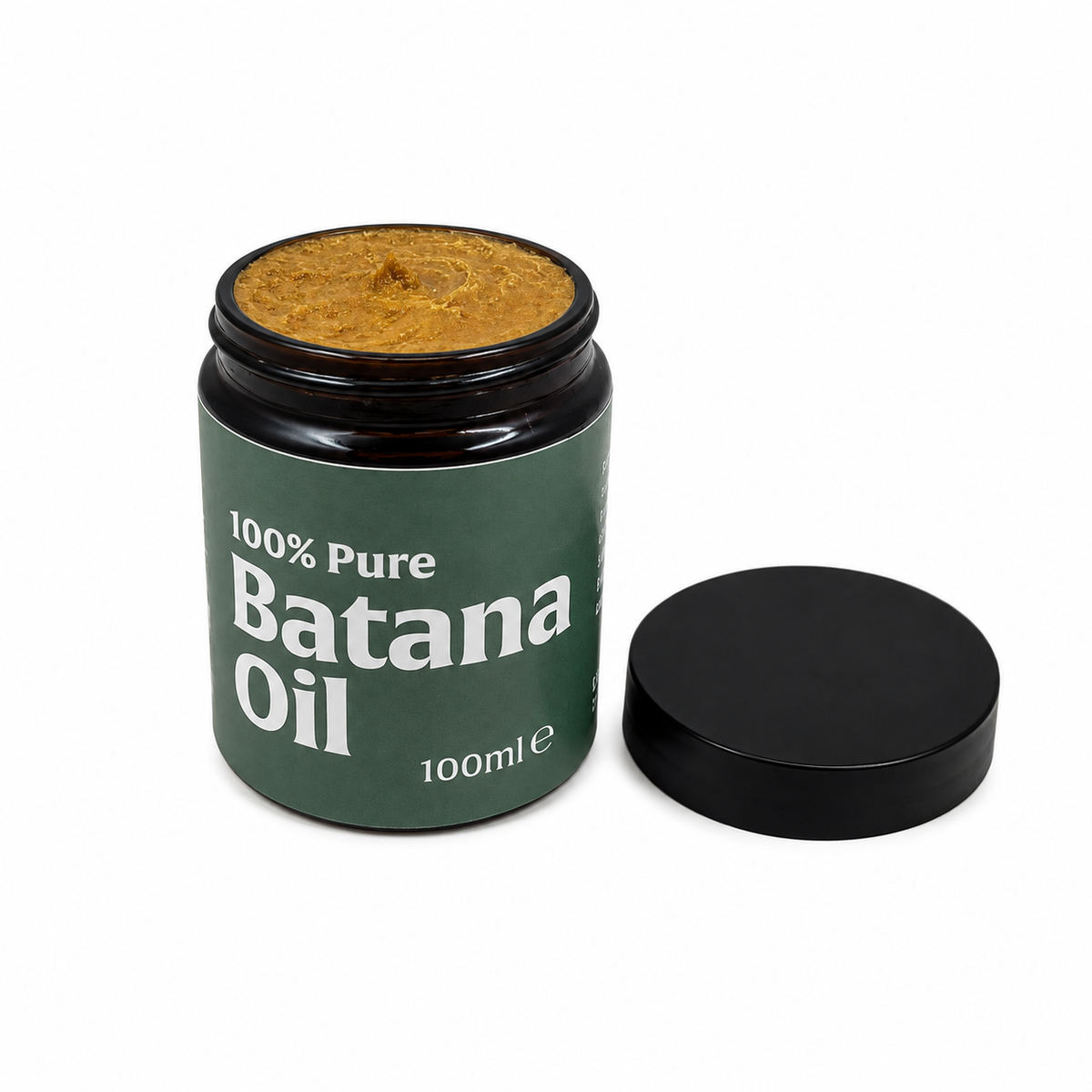 A 100ml jar of 100% Pure Batana Oil with its black lid placed beside it on a clean white background. The jar has a dark green label with white text, and the open jar reveals a golden-brown paste inside.