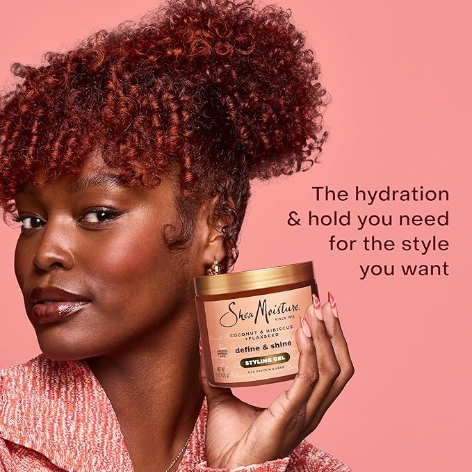 Woman holding a Shea Moisture product with text on a pink background