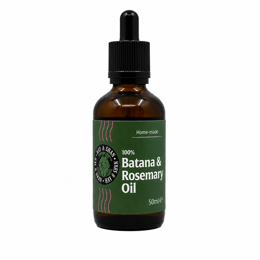 A 50ml amber glass dropper bottle of '100% Batana & Rosemary Oil' by the brand 'My Herbs & Herbs', featuring a dark green label and a black dropper cap, set against a plain white background.