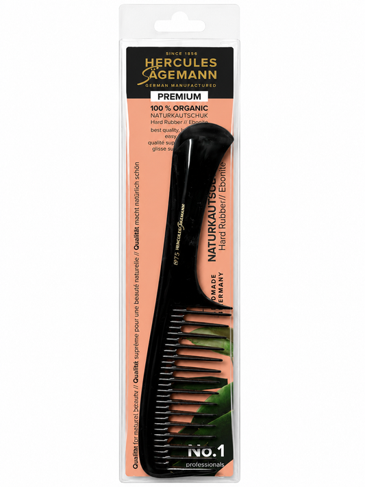 A black Hercules Agemann hard rubber hair comb in its original retail packaging, featuring a peach and black cardboard backing with product details.