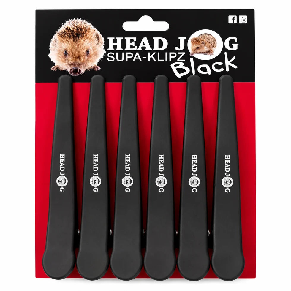 Six black pet clip-on headphones labeled 'HEAD JOG SUPA-KLIPZ Black' in white text, packaged on a red and black backing card with a small hedgehog photo.