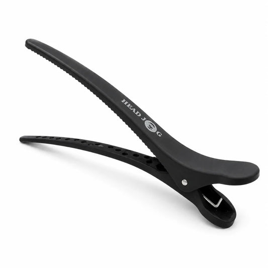 Black hair clip with 'HEAD' branding on a white background