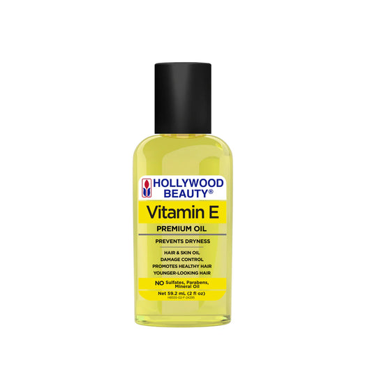 Bottle of Hollywood Beauty Vitamin E Premium Oil on a white background
