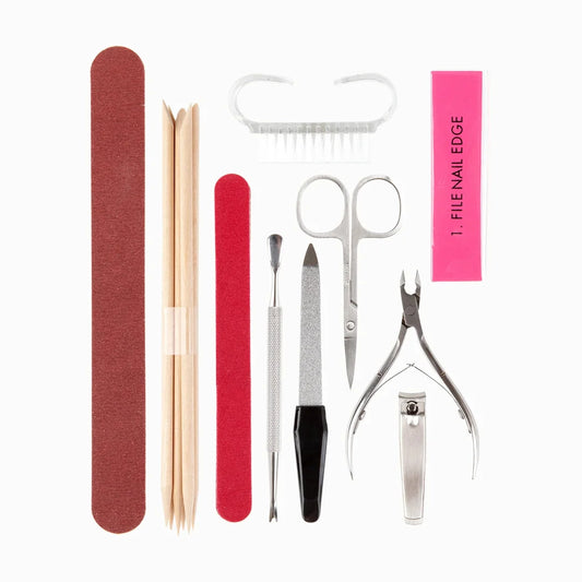 Set of nail care tools including a file, scissors, and other instruments on a white background.