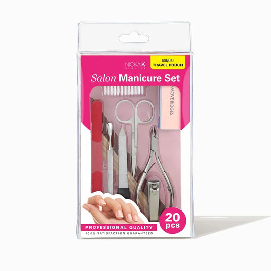 A packaged salon manicure set in a clear plastic retail box with a pink and white label. Visible tools include metal nail clippers, cuticle tools, a nail file, and a small travel pouch, with a hand illustration on the front.