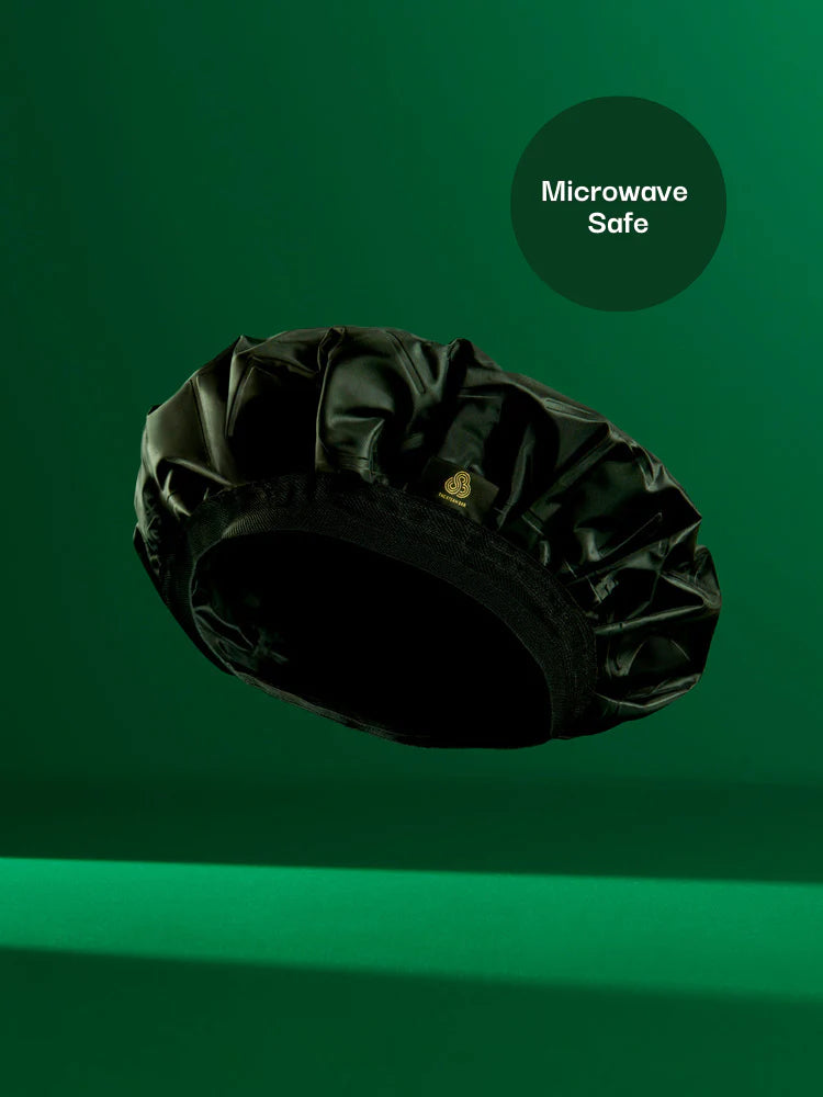Black microwaveable product on a green background with 'Microwave Safe' label.