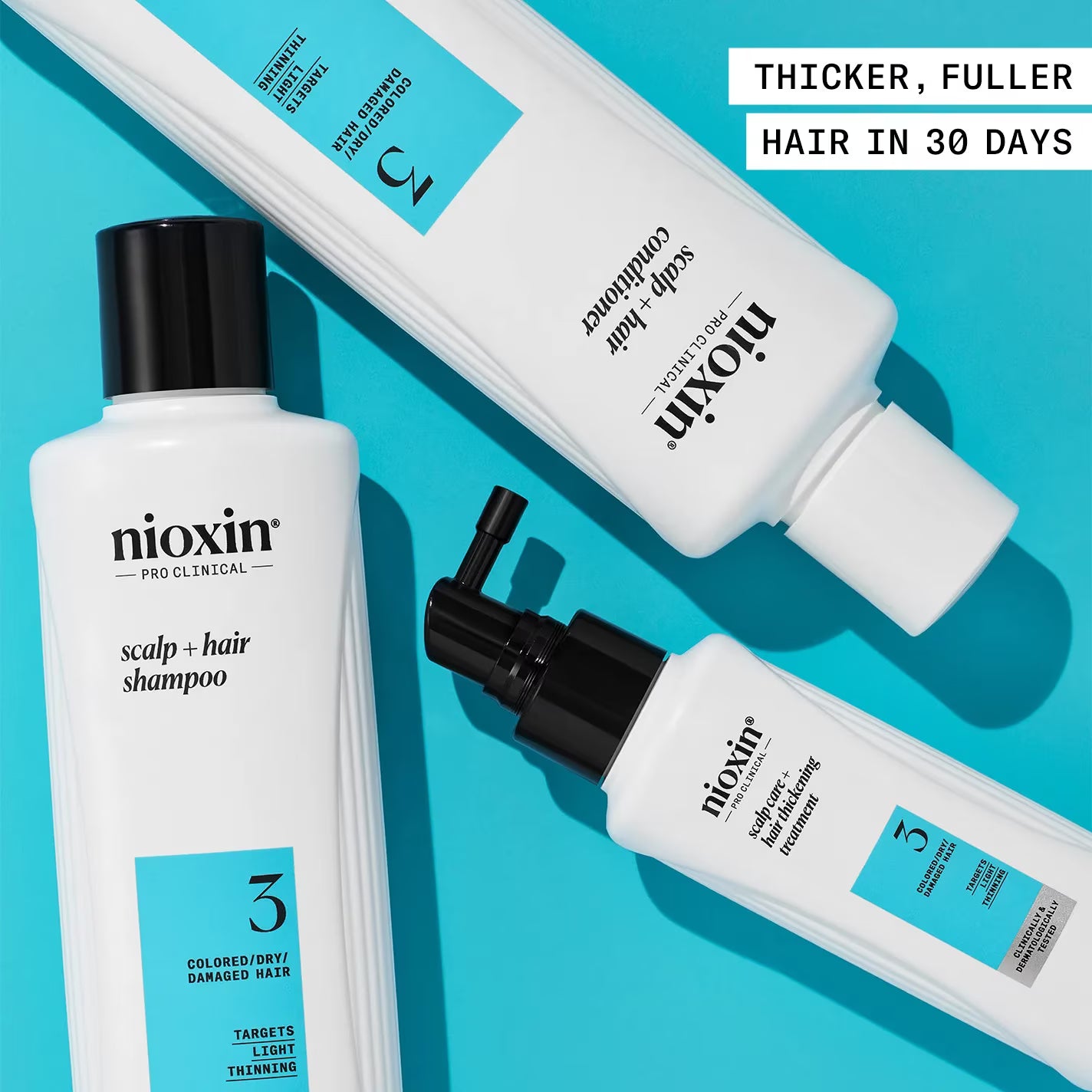 Nioxin hair care products on a blue background