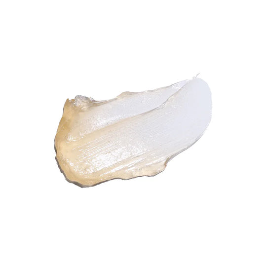 Partial view of a white and beige object on a white background