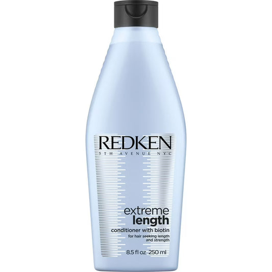 Redken extreme length conditioner bottle on a white background
