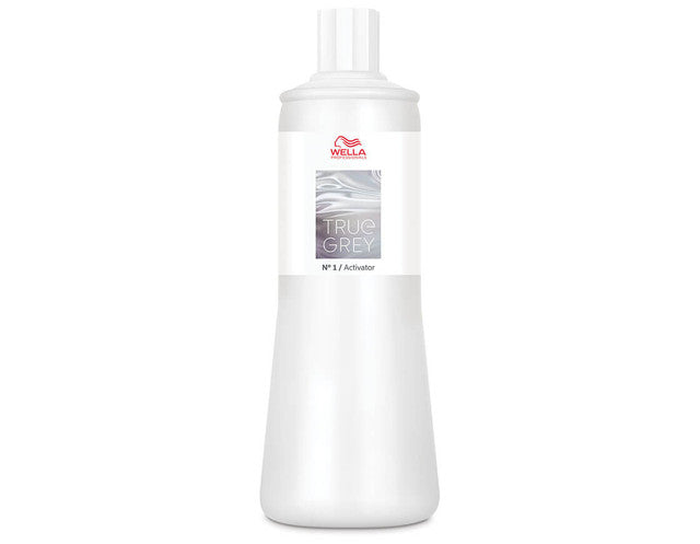 Wella True Grey hair color product bottle on a white background