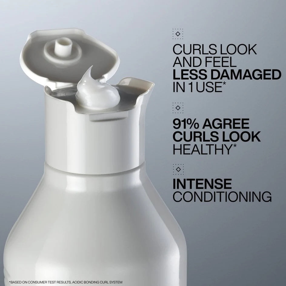White hair care product bottle with text on a gray background