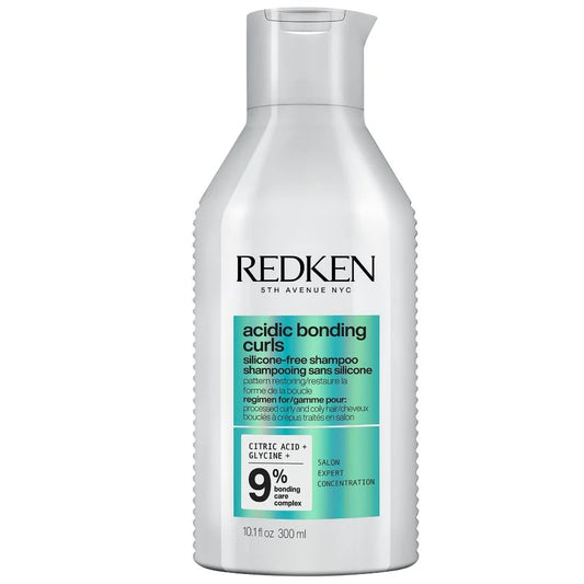 Redken Acidic Bonding Curls shampoo bottle on a white background
