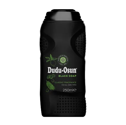 Dudu-Osun black soap bar on a textured white background