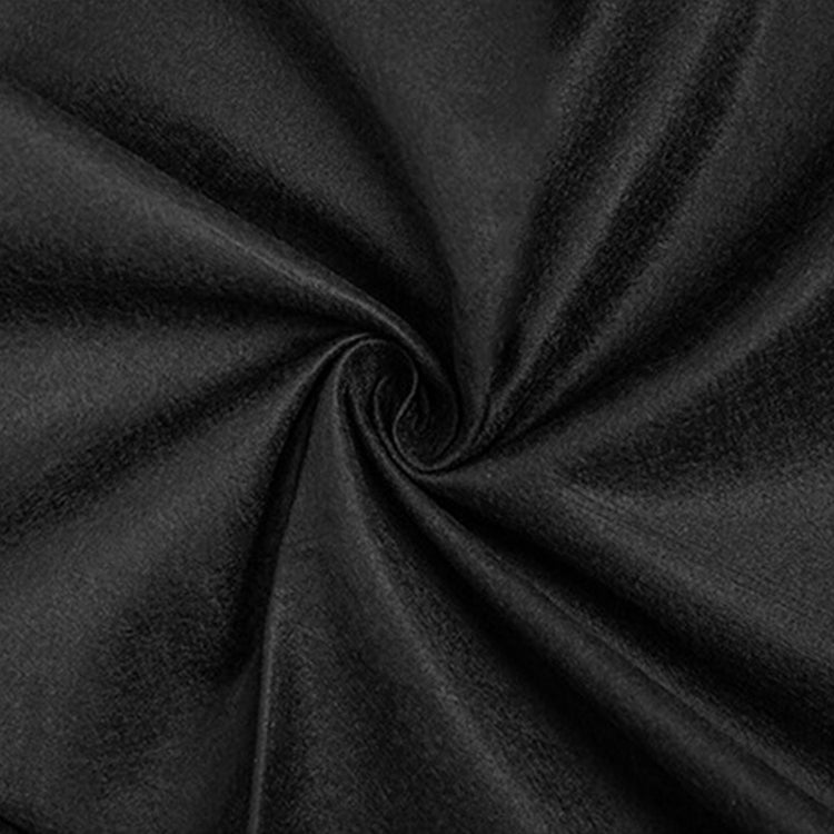 Close-up of black fabric with a swirl pattern