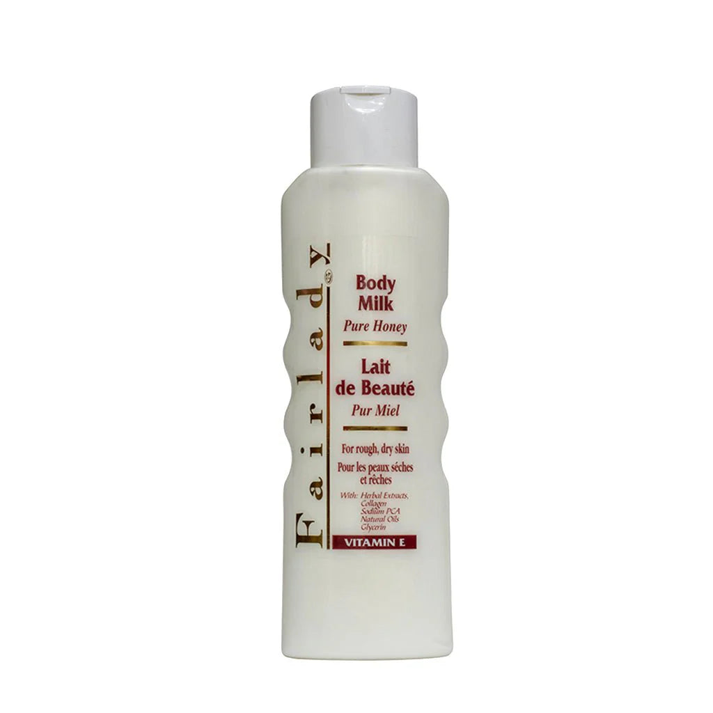 Body milk bottle labeled 'Lait de Beaute' on a white background