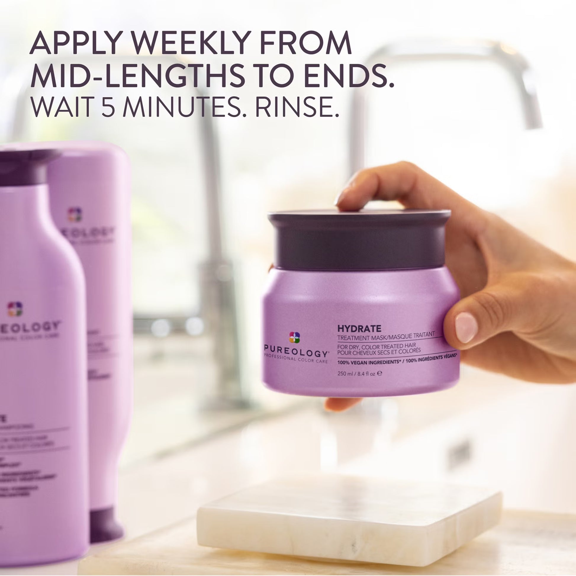 Purple hair care product with application instructions on a blurred background