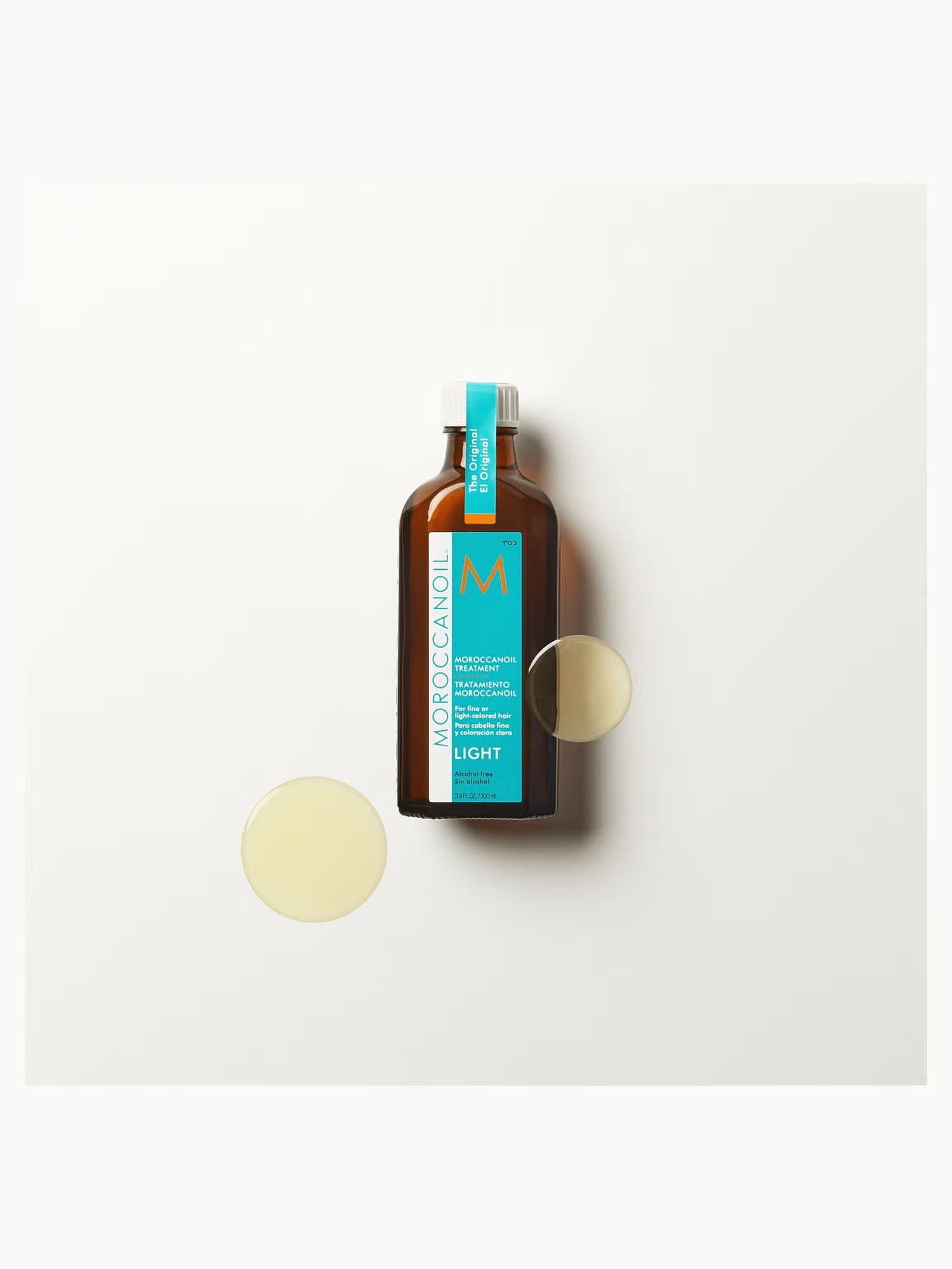 Brown bottle with blue label on a white background