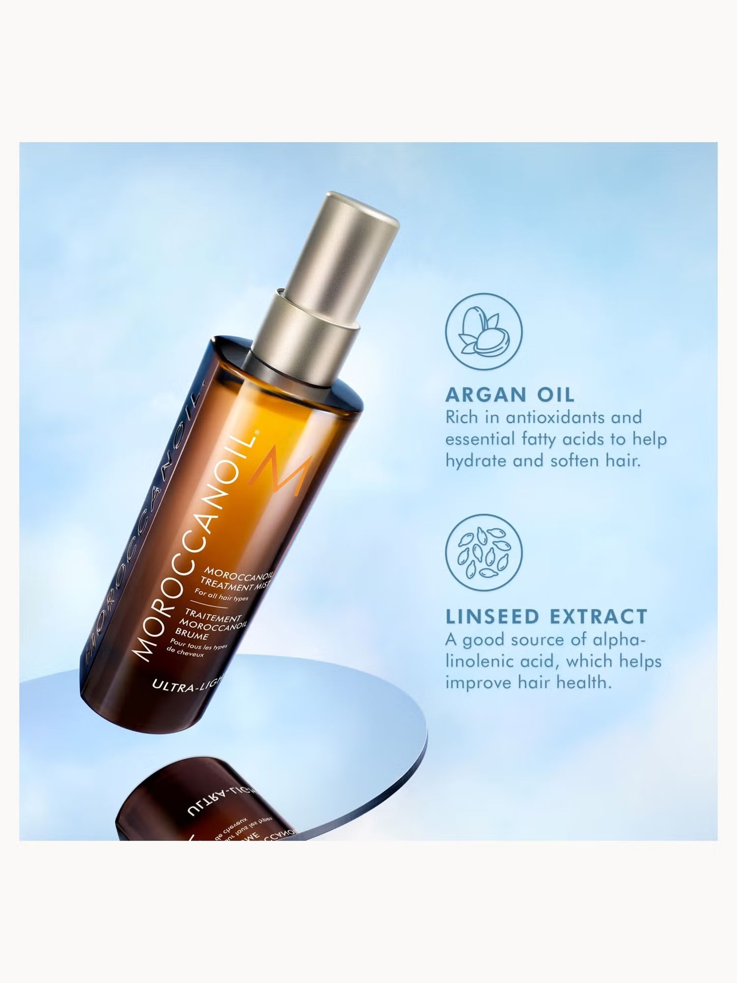 Moroccan Oil hair treatment bottle with product details on a light blue background
