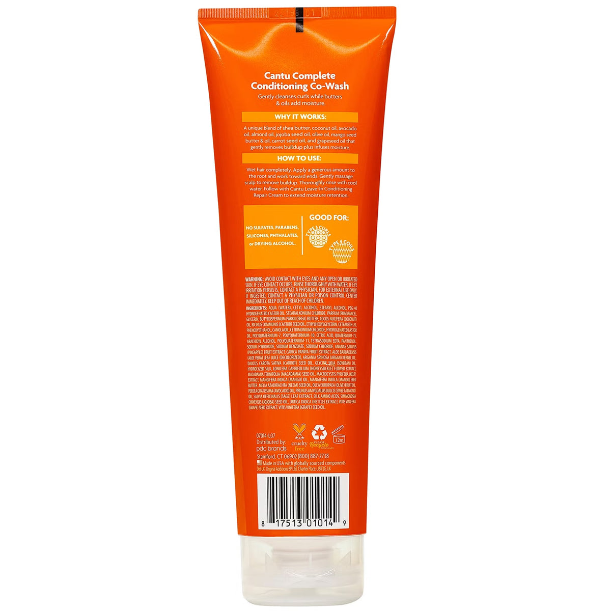 The back of an orange squeeze tube for Camu Complete Conditioner Co-Wash, featuring product information, instructions, a barcode, and a clear cap, on a white background.