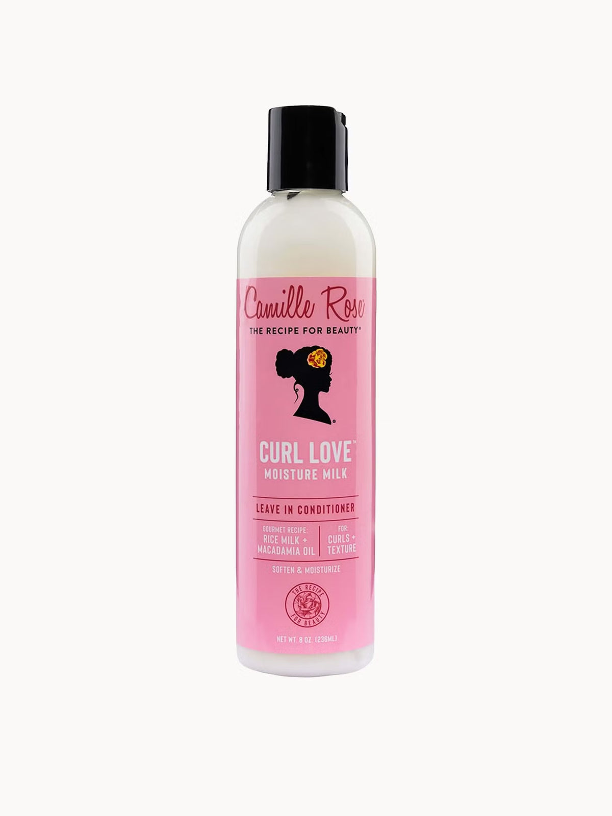 A bottle of Camille Rose Curl Love Moisture Milk leave-in conditioner, featuring a pink label and black cap on a light gray background.