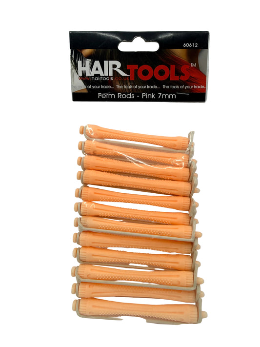 Pack of hair extensions with packaging on a gray background