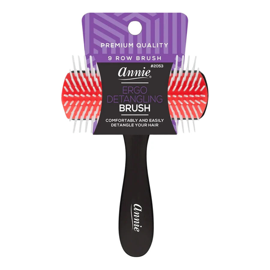 Annie Ergo Detangling Brush in a 9-row design, featuring a black handle, red and white bristles, and a purple cardboard hanger with product details.
