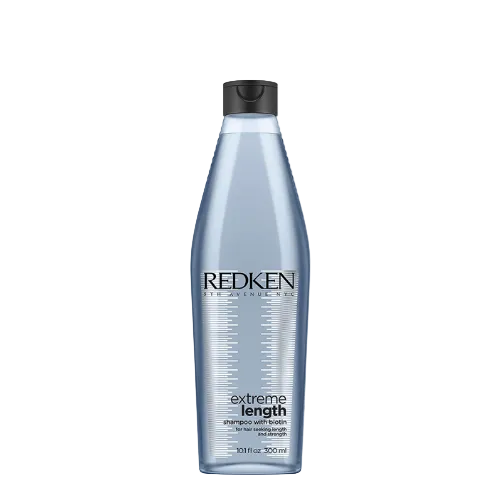 A bottle of redken extreme length shampoo