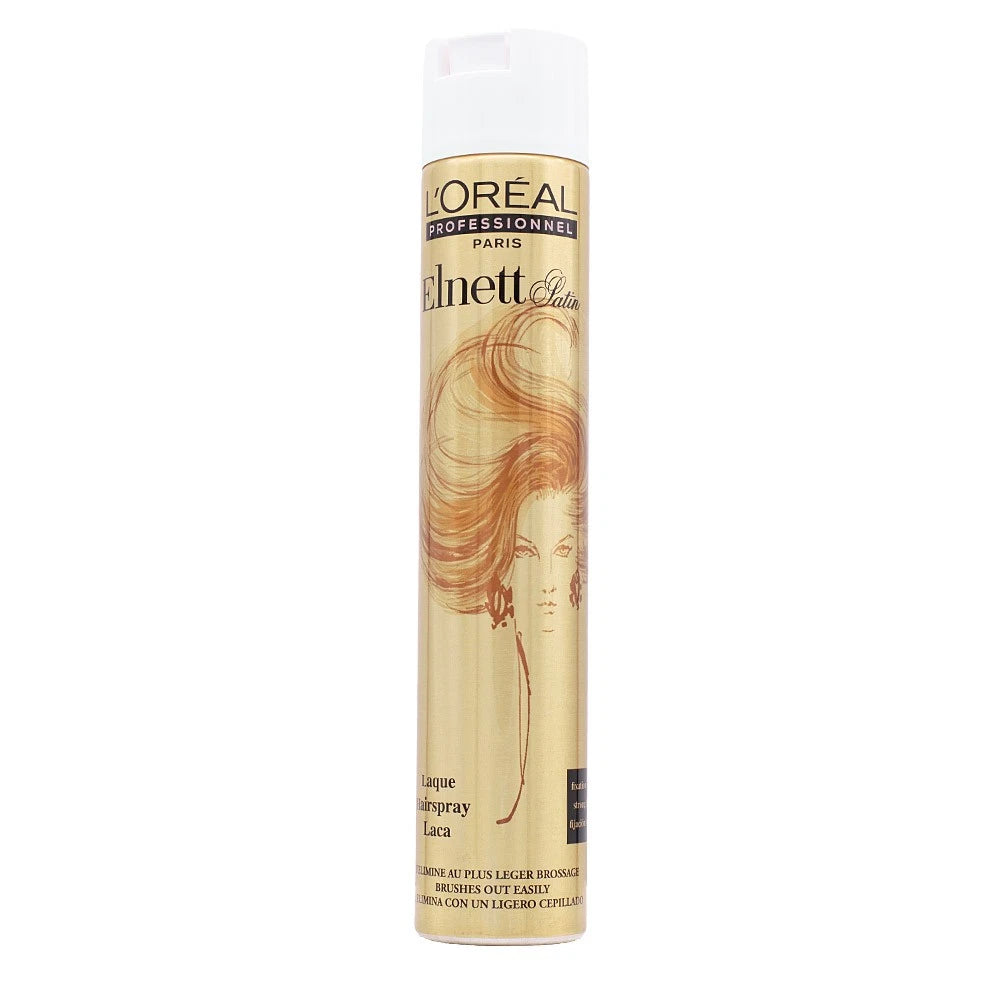 L'Oréal Professionnel Paris Elmett Laca Hair Styling Spray in a tall, slim gold can with a white cap, featuring an illustration of flowing light brown hair.