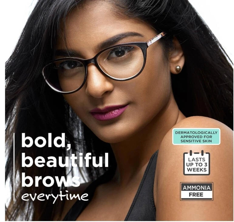 A close-up beauty ad showing a woman with dark hair wearing black cat-eye eyeglasses. Large text reads 'bold, beautiful brows everytime,' and callout badges on the right say 'Dermatologically Approved for Sensitive Skin,' 'Lasts Up to 3 Weeks,' and 'Ammonia Free.